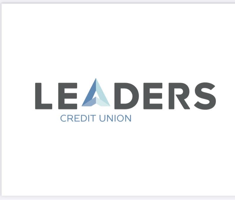 Logo featuring the text "LEADERS" in bold, dark gray letters above "CREDIT UNION" in lighter gray. An abstract blue triangular shape is positioned above the text.