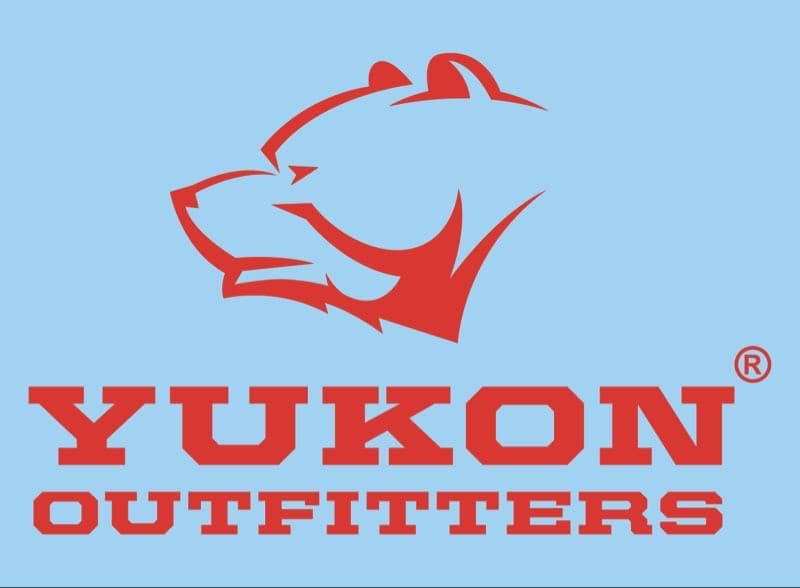 Red bear silhouette above the text "YUKON OUTFITTERS" in bold red font on a light blue background.